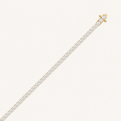 Yellow gold high-carat diamond tennis bracelet with closed clasp