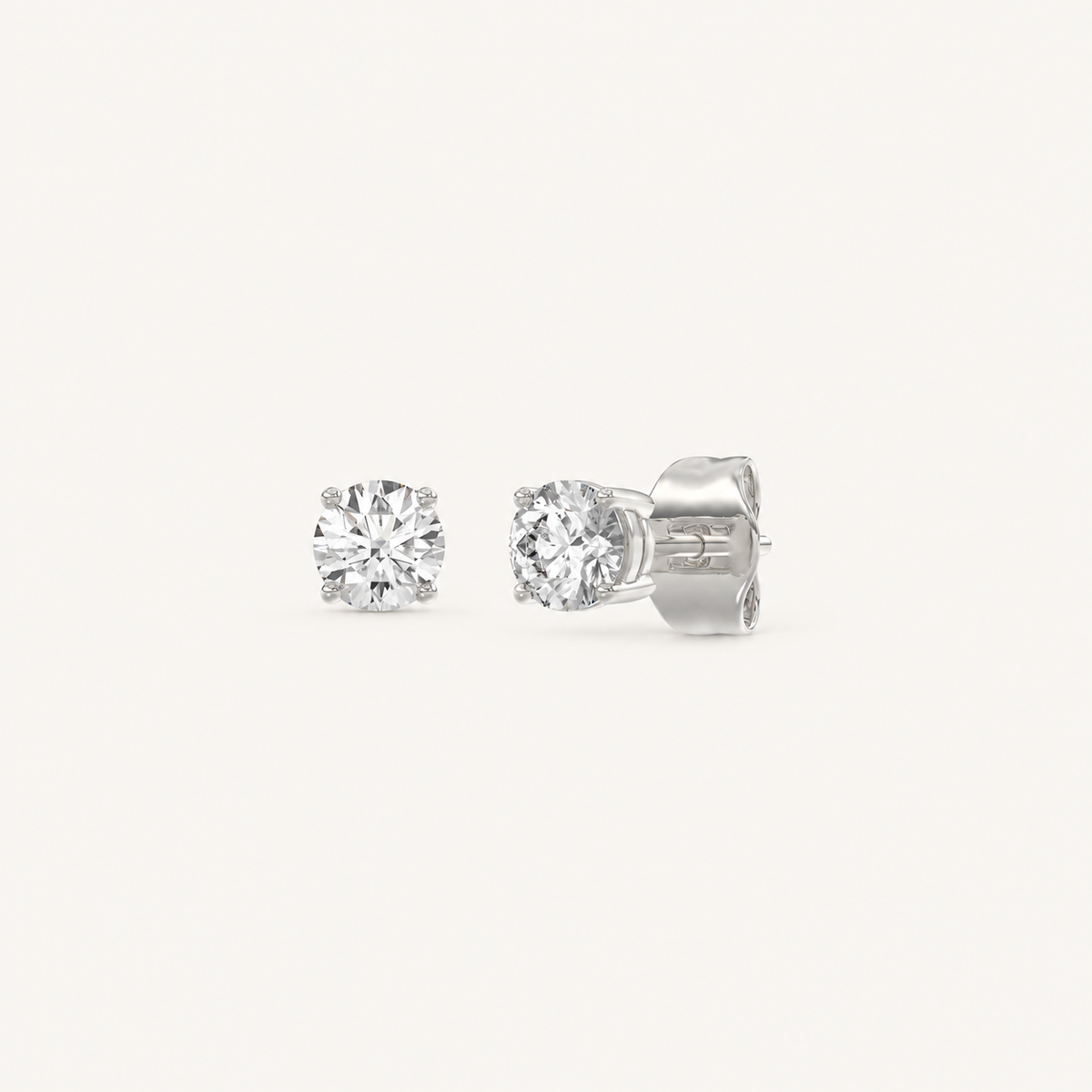 White gold round-cut four-prong basket lab-grown diamond stud earrings, 0.5 ct total weight