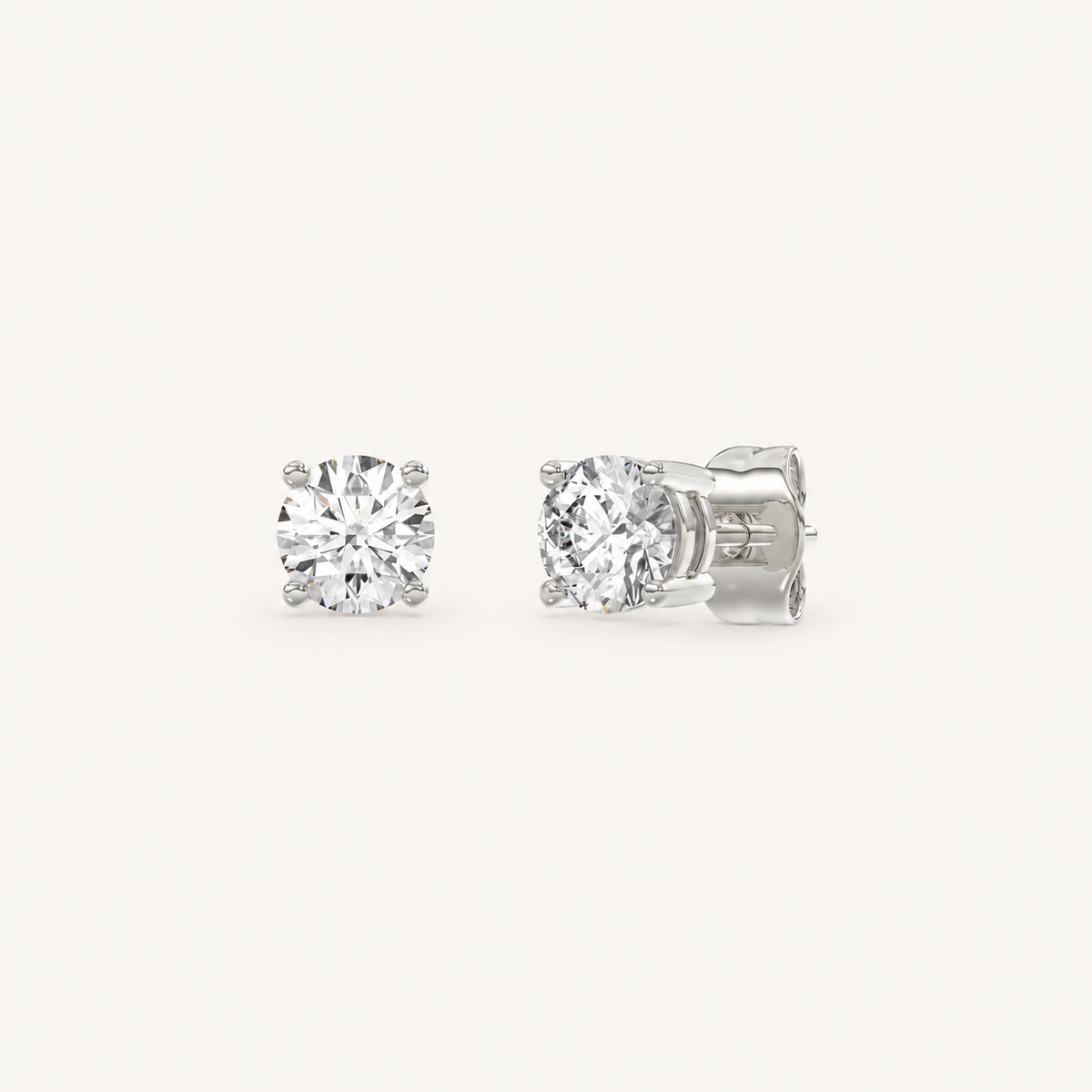 White gold round-cut four-prong basket lab-grown diamond stud earrings, 1 ct total weight