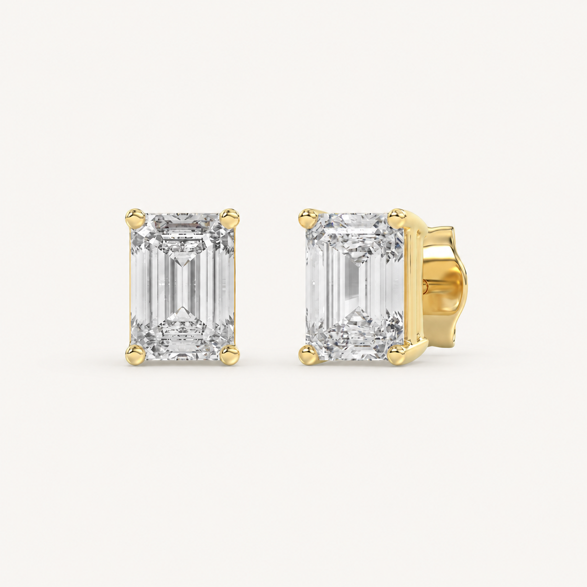 Emerald-cut lab-grown diamond stud earrings in yellow gold, 1.5 ct total