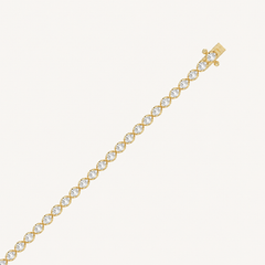 Yellow gold oval-cut diamond bracelet with closed clasp