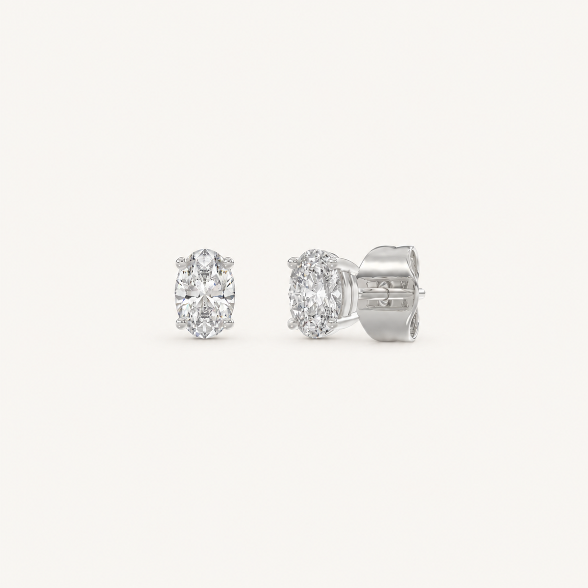 Oval lab-grown diamond stud earrings in white gold, 0.5 ct total
