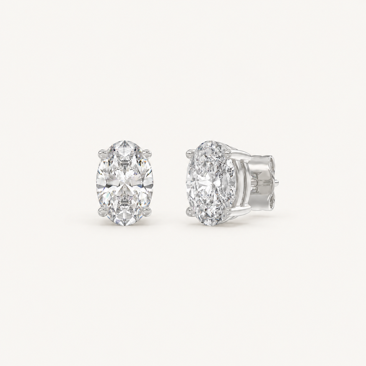 Oval lab-grown diamond stud earrings in white gold, 1.5 ct total