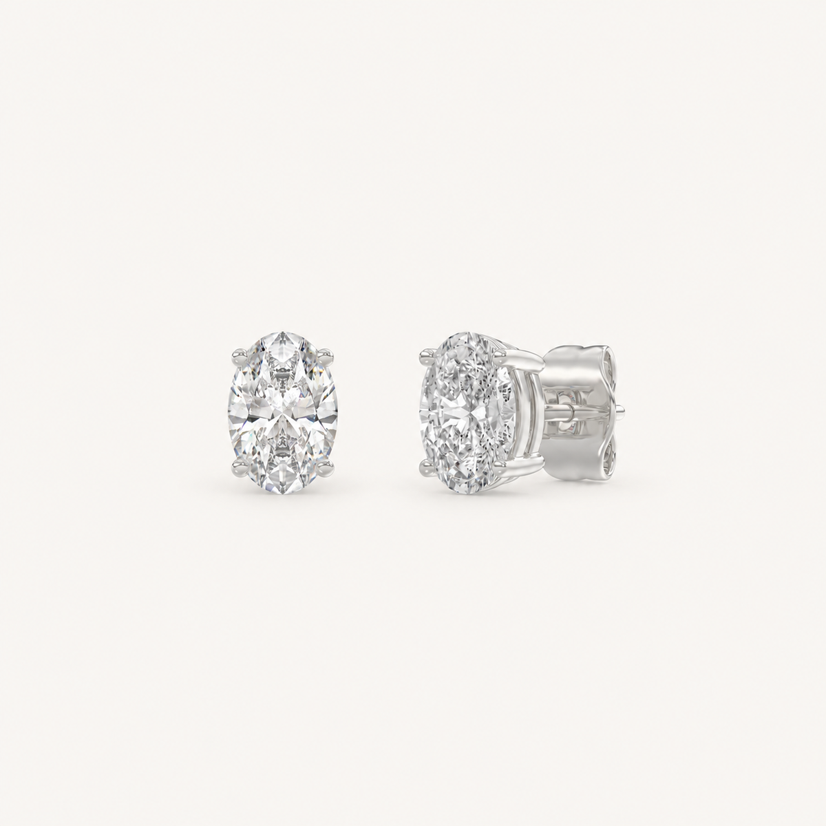 Oval lab-grown diamond stud earrings in white gold, 1 ct total