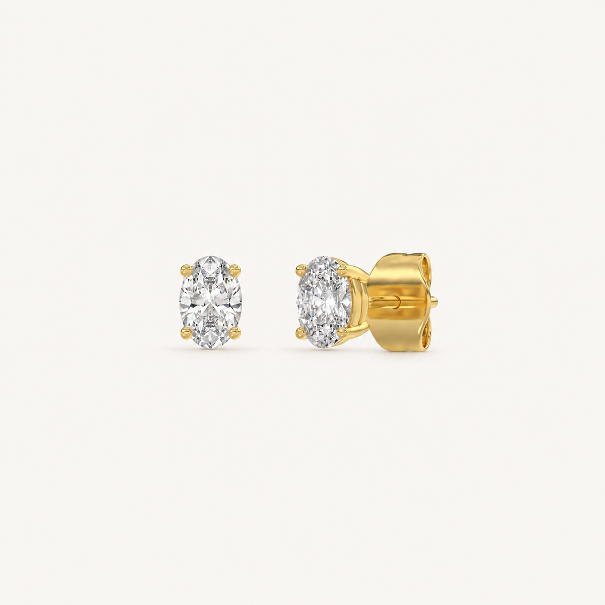 Oval lab-grown diamond stud earrings in yellow gold, 0.5 ct total