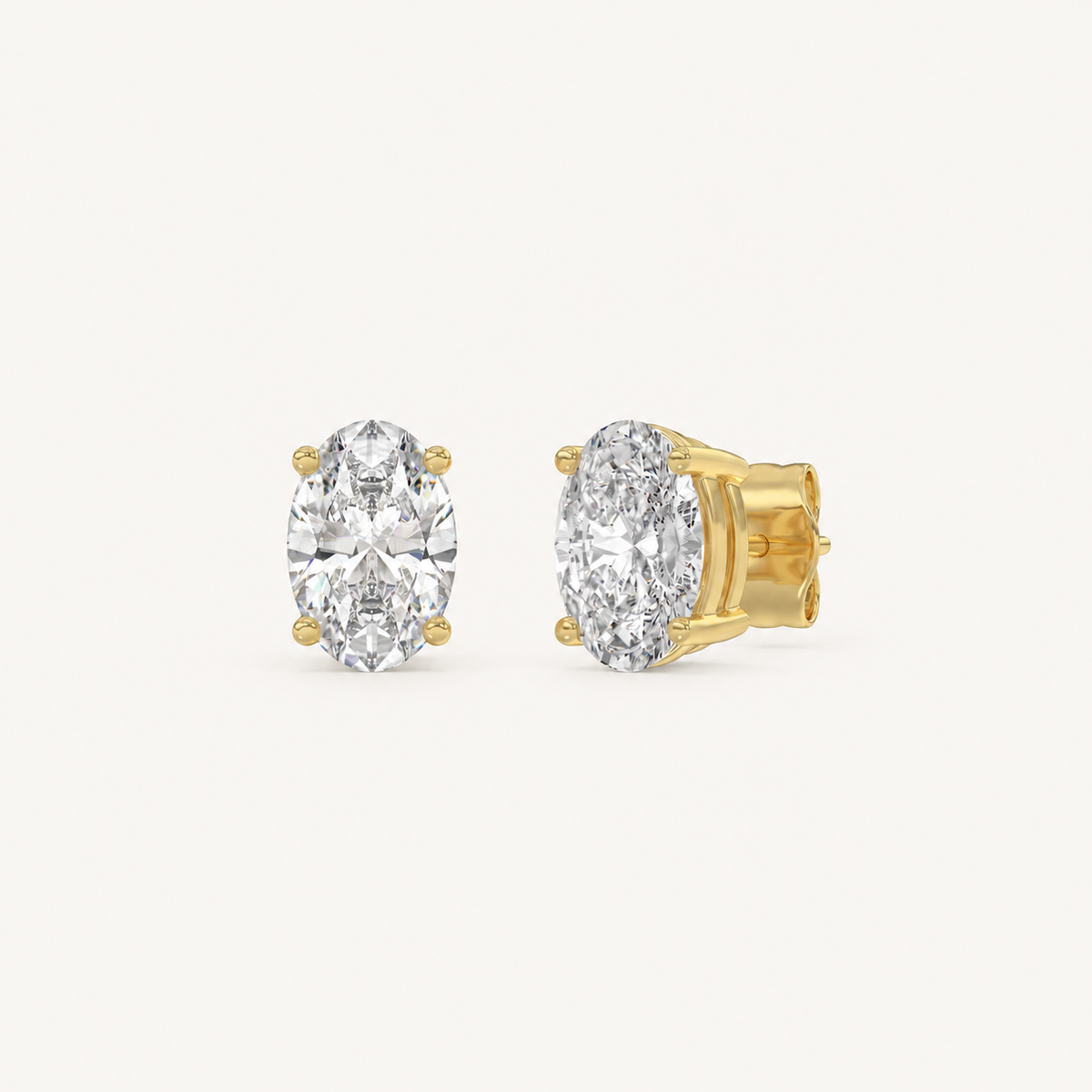 Oval lab-grown diamond stud earrings in yellow gold, 1.5 ct total