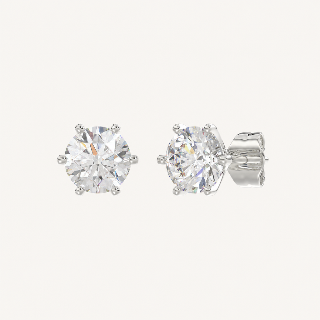 Six-prong round basket lab-grown diamond stud earrings in white gold, angled view