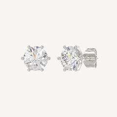 Six-prong round basket lab-grown diamond stud earrings in white gold, angled view