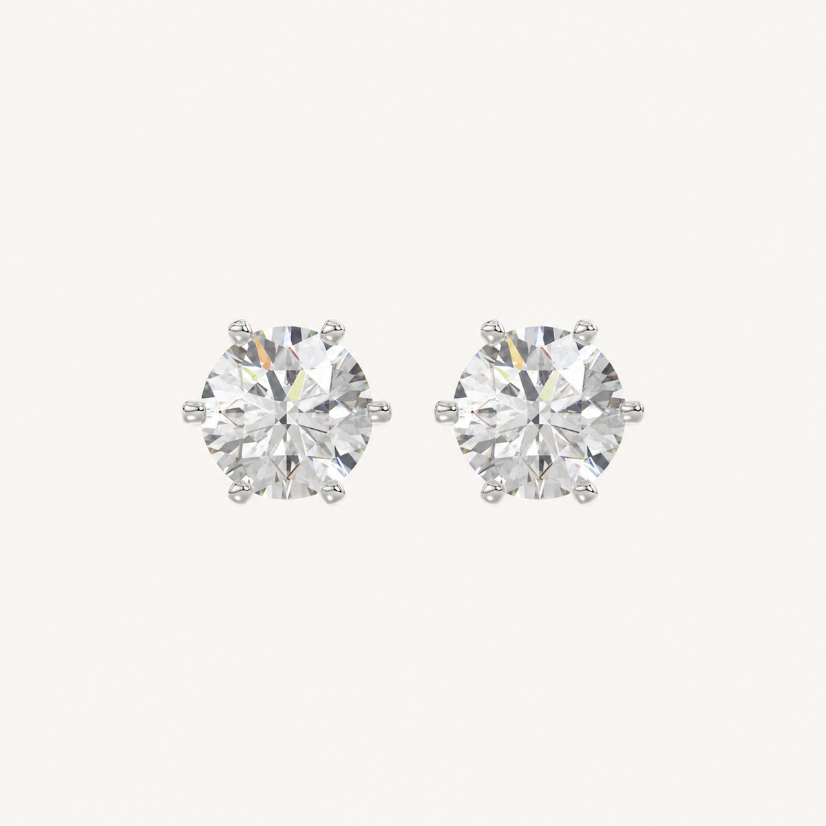 Six-prong round basket lab-grown diamond stud earrings in white gold, front pair view