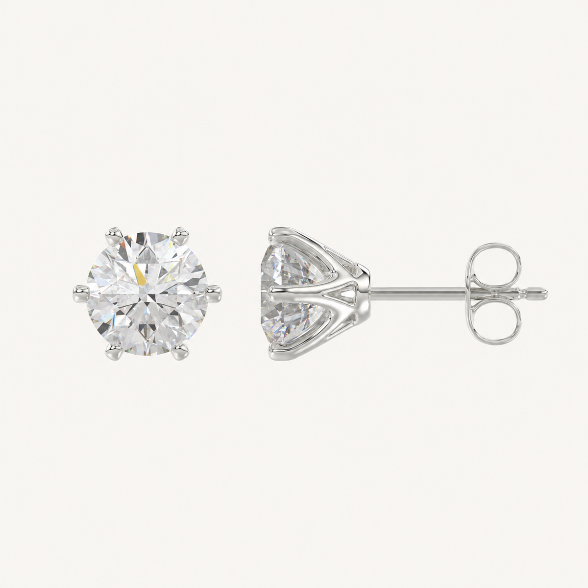 Six-prong round basket lab-grown diamond stud earrings in white gold, profile view