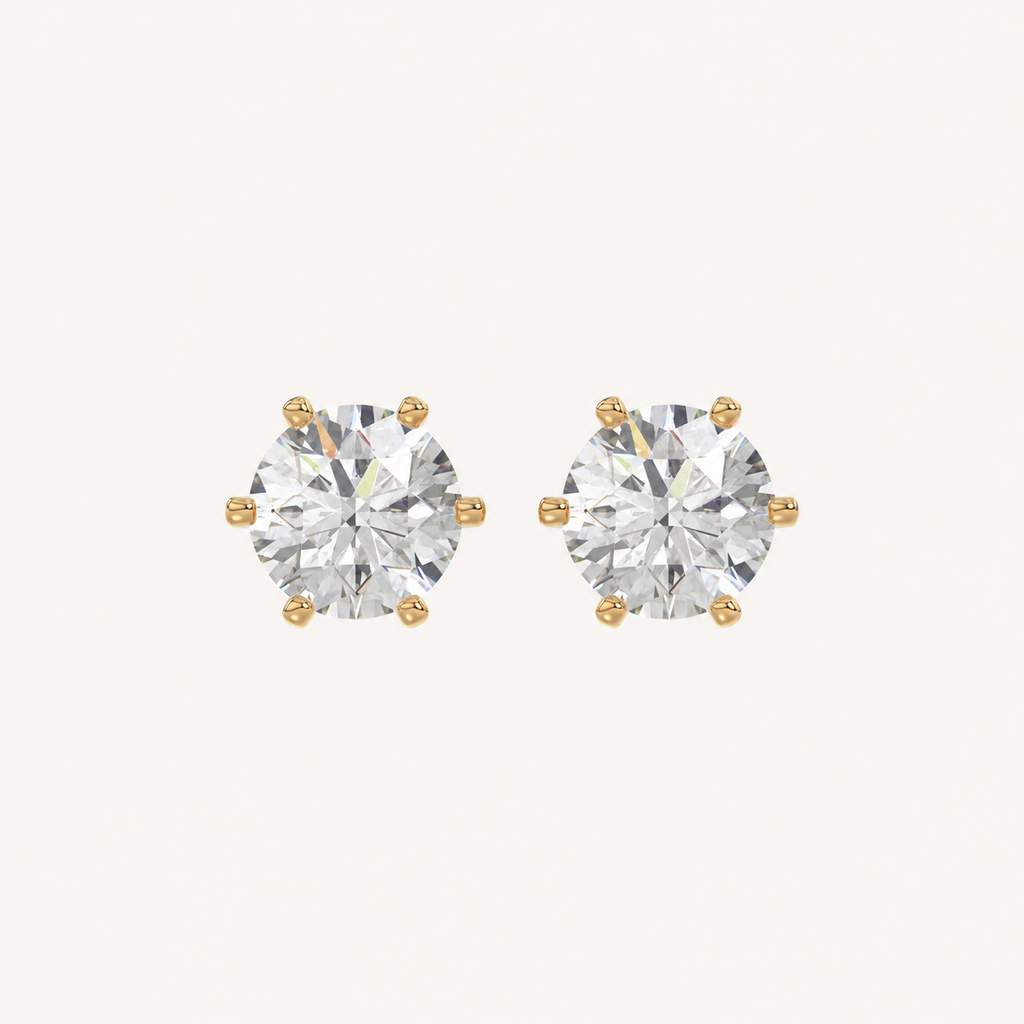 Six-prong round basket lab-grown diamond stud earrings in yellow gold, front pair view