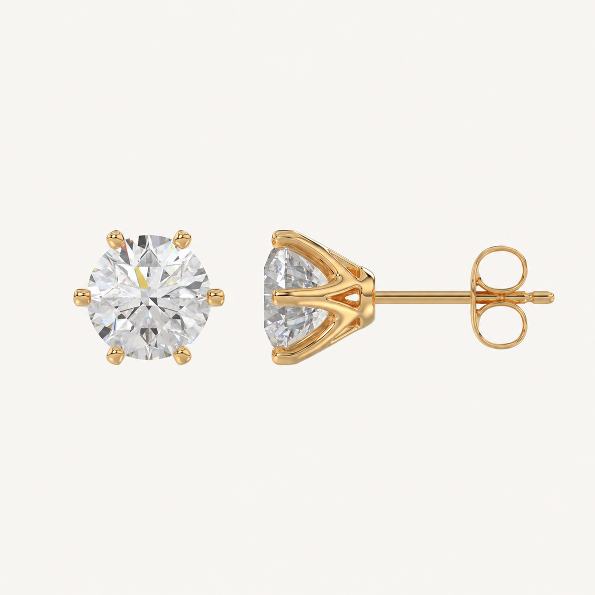 Six-prong round basket lab-grown diamond stud earrings in yellow gold, profile view