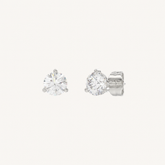 Three-prong martini lab-grown diamond stud earrings in white gold, angled view