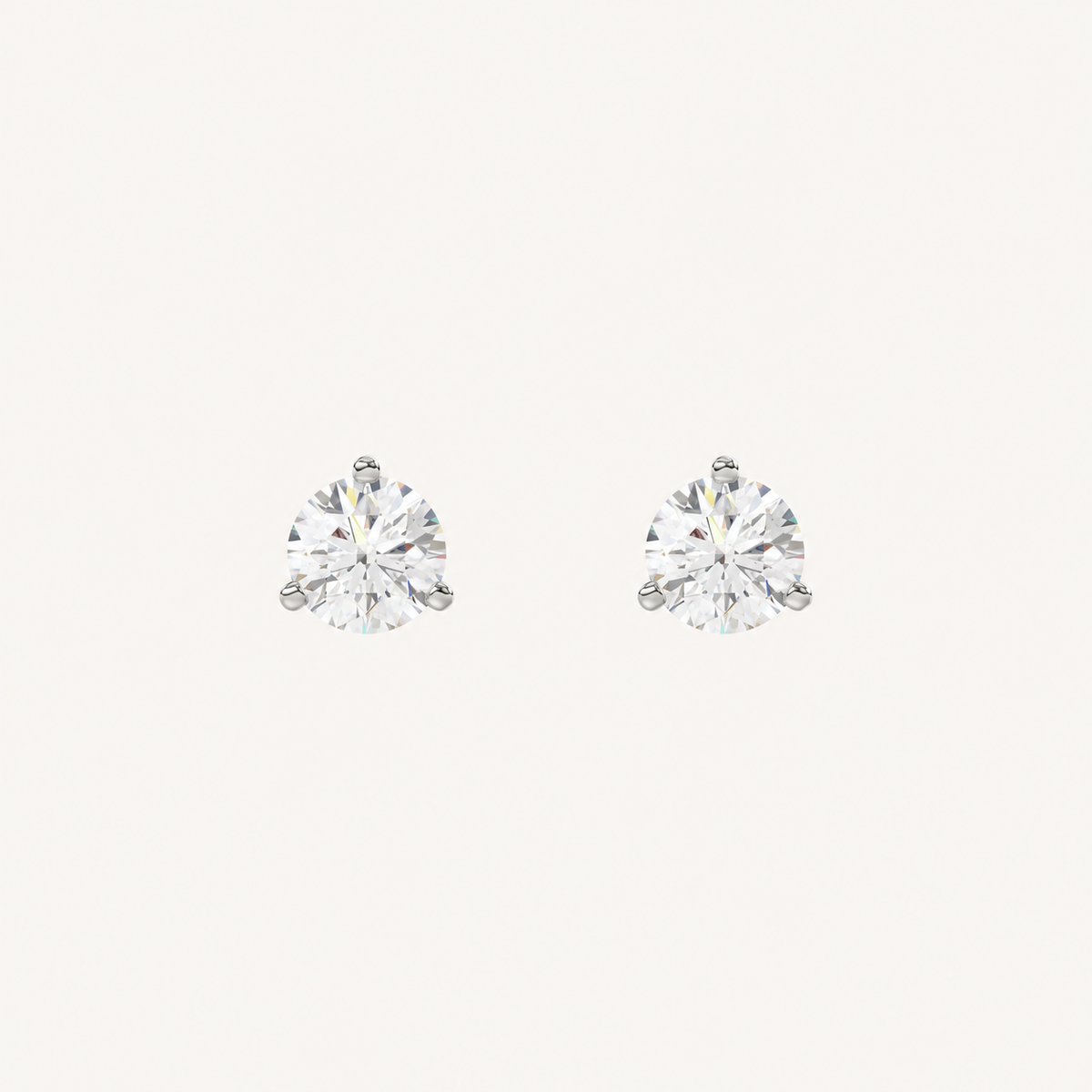 Three-prong martini lab-grown diamond stud earrings in white gold, front pair view
