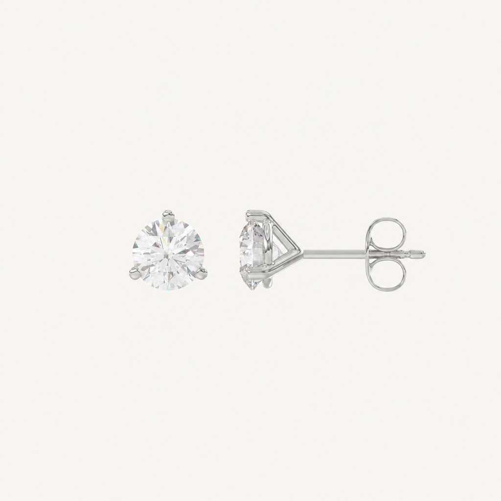 Three-prong martini lab-grown diamond stud earrings in white gold, profile view