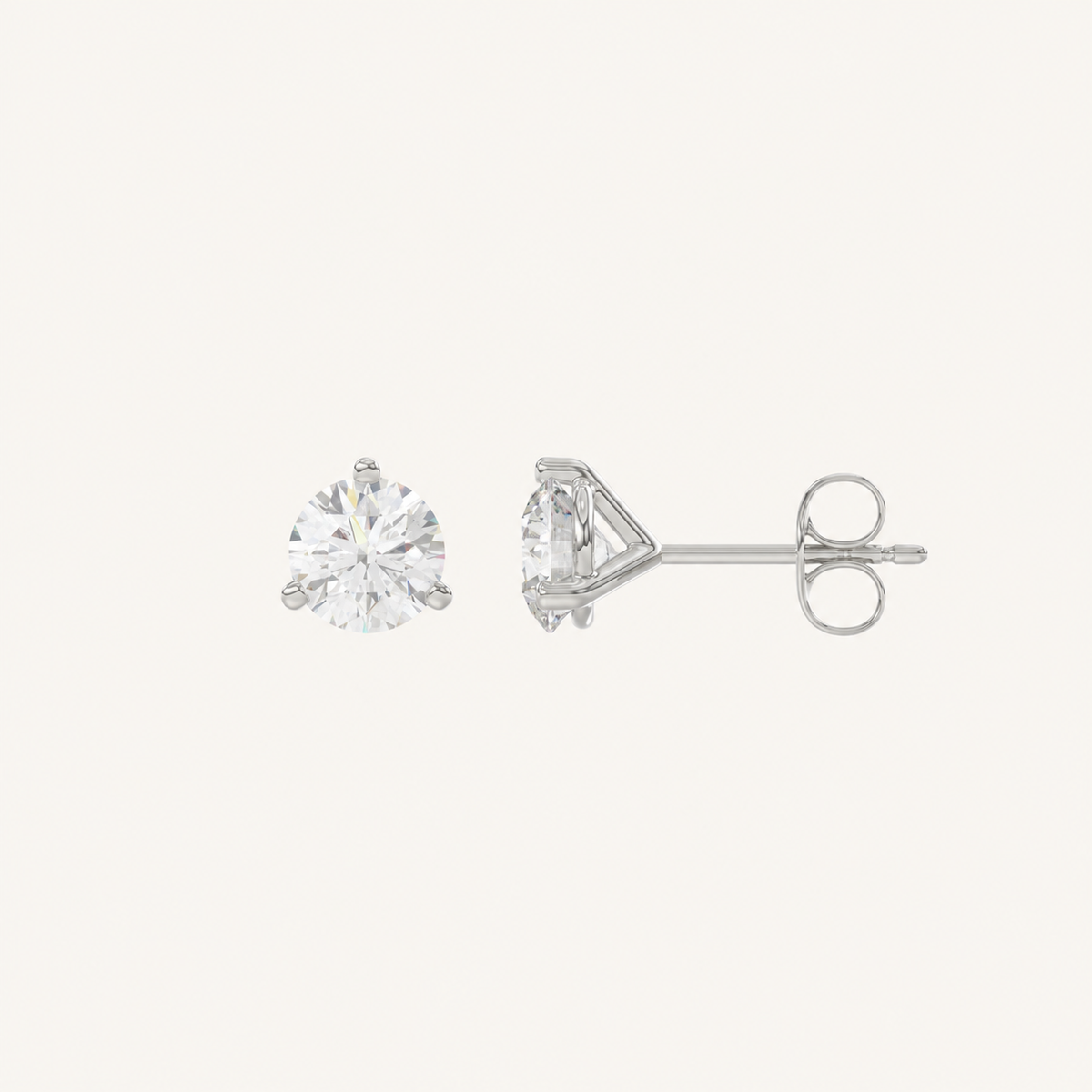 Three-prong martini lab-grown diamond stud earrings in white gold, profile view