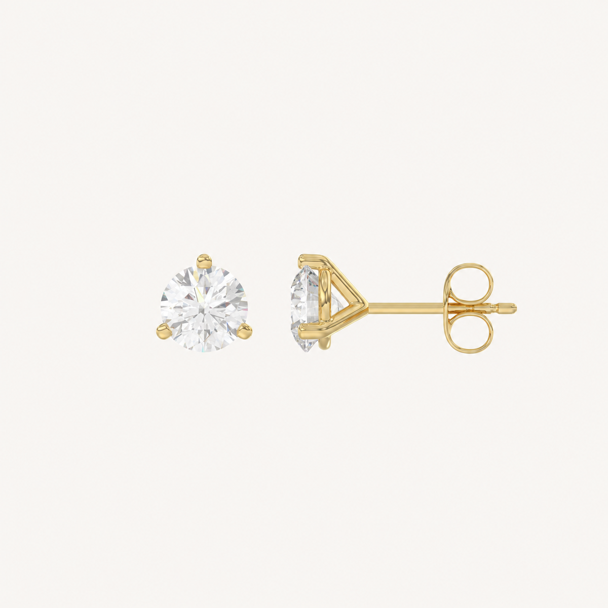 Three-prong martini lab-grown diamond stud earrings in yellow gold, profile view